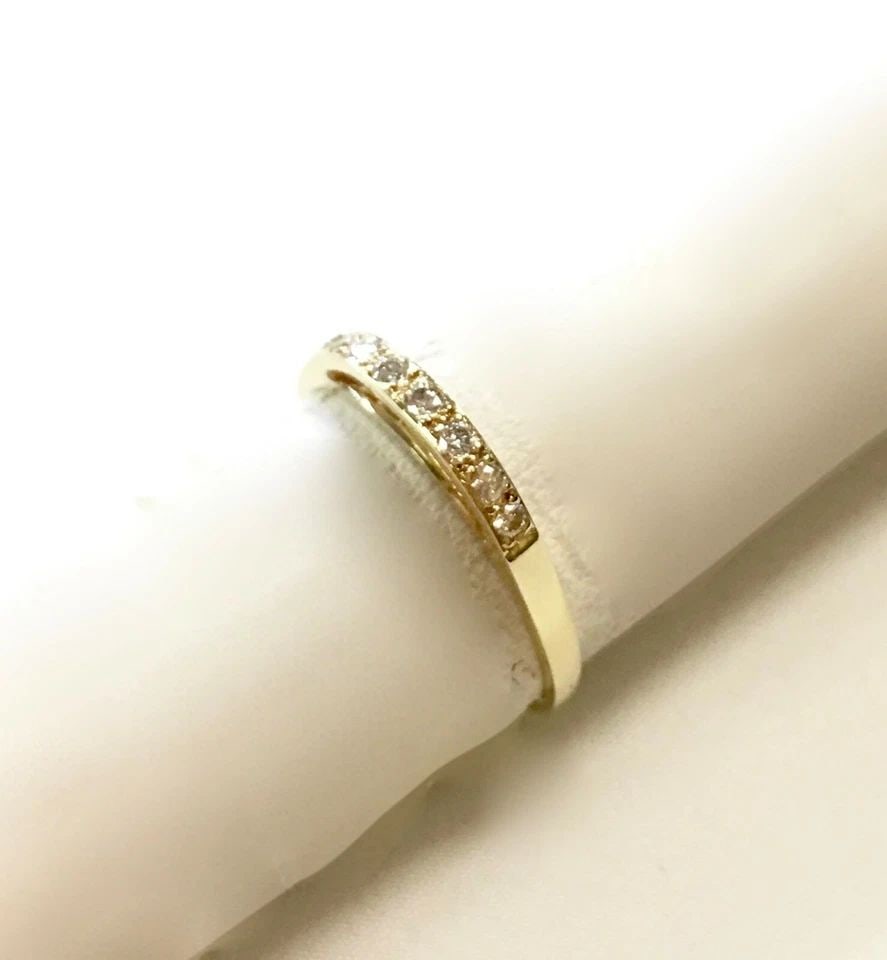 14K YELLOW GOLD RING/BAND WITH 0.12CTW NATURAL DIAMONDS (SIZE 8) 1.8 GRAM: 14K YELLOW GOLD RING BAND WITH 0.12CTW DIAMONDS 14k Yellow Gold Ring with Diamonds You are bidding on a 14k Yellow Gold Ring with Diamonds. The ring has been fully restored by our in house Jewelers. T