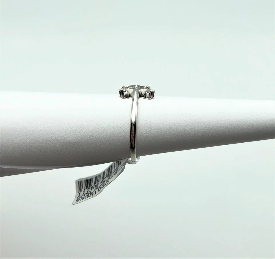 NEW 10K WHITE GOLD X RING SET WITH 0.25CTW NATURAL DIAMONDS (SIZE 7) 2.2 GRAM: 10K WHITE GOLD X RING SET WITH 0.25CTW DIAMONDS (SIZE: 7) 10k White Gold X Ring set with 0.25ctw Diamonds You are bidding on a 10k White Gold X Ring set with 0.25ctw Diamonds. The ring has been fully 