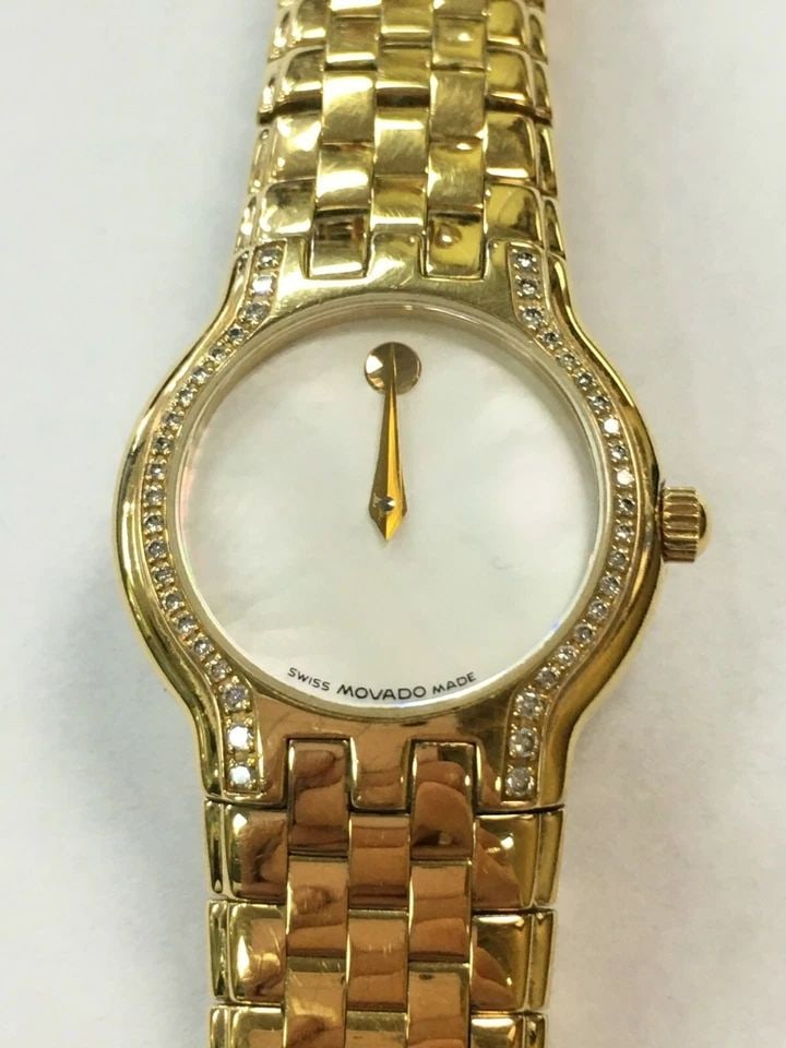 WOMAN'S MOVADO WATCH WITH DIAMOND MOP DIAL 87 E4 1852 S: WOMAN'S MOVADO WATCH WITH DIAMOND MOP DIAL 87 E4 1852 S Woman's MOVADO Watch with Diamond MOP Dial 87 E4 1852 S You are bidding on a Woman's MOVADO Watch with Diamond MOP Dial 87 E4 1852 S. Watch has 