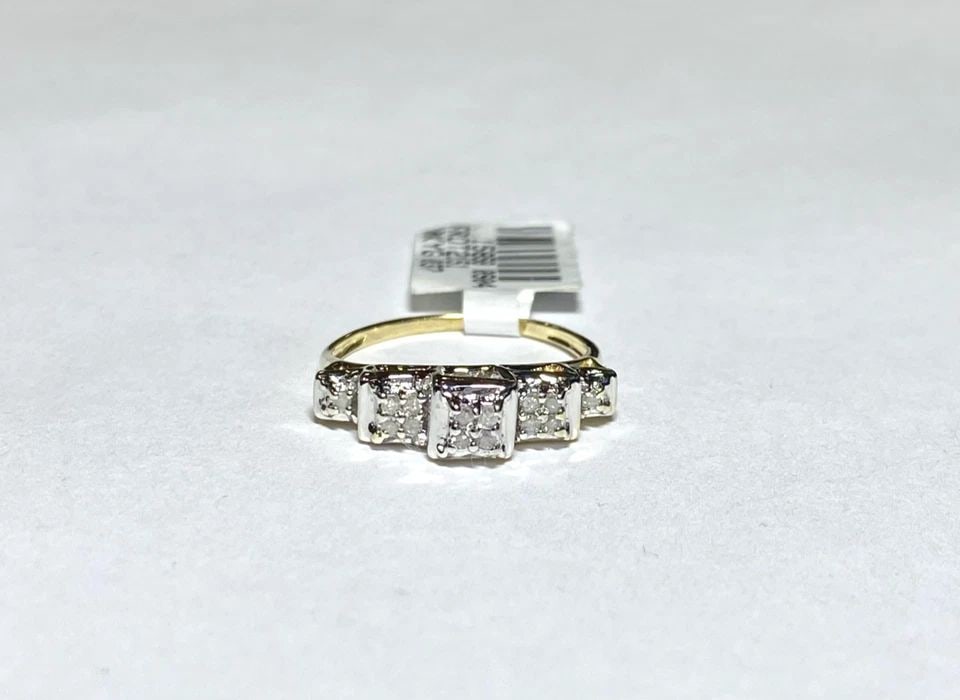 NEW 10K YELLOW GOLD RING WITH 0.12CTW DIAMONDS (SIZE 6.75) 2.1 GRAM: WOMEN'S 10K YELLOW GOLD RING WITH 0.12CT DIAMONDS (SIZE 6.75) Women's 10k Yellow Gold Ring with 0.12CT Diamonds (Size 6.75) You are bidding on a new with tags Women's 10k Yellow Gold Ring with 0.12CT 