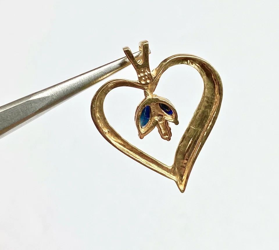 10K YELLOW GOLD HEART PENDANT, MARQUISE NATURAL SAPPHIRE, DIAMONDS 1.5 GRAM: 10K YELLOW GOLD HEART PENDANT WITH MARQUISE GENUINE SAPPHIRE AND DIAMONDS 10k Yellow Gold Heart Pendant with Marquise Genuine Sapphire and Diamonds You are bidding on a pre-owned 10k Yellow Gold Heart