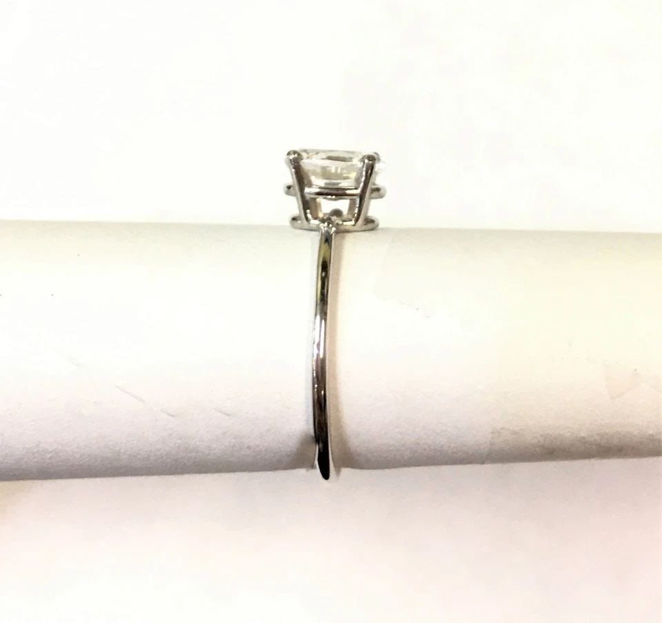 14K WHITE GOLD WOMAN'S RING WITH OVAL 7MM WHITE SAPPHIRE (SIZE 4.25) 1.2 GRAM (1 of 2)