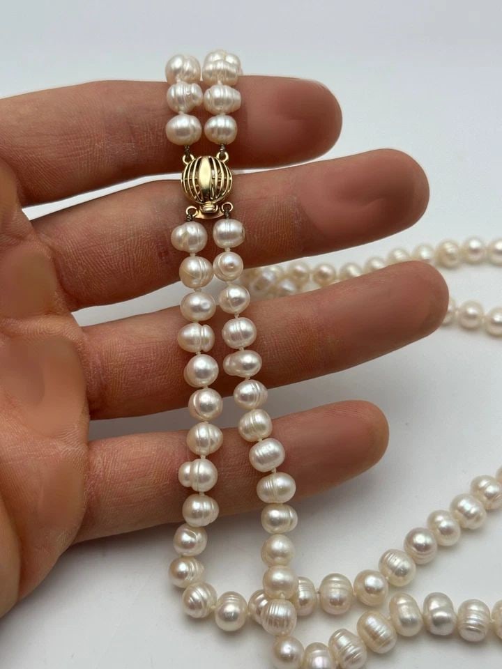 TWO ROW FRESH WATER CULTURED PEARL NECKLACE, 14K GOLD CLASP 17" 18" 58.8G: Double Layered Fresh Water Pearl Necklace with 14k Gold Clasp Condition: Used, has marks and scratches on it Material: 14k Yellow Gold Clasp Necklace Size: One is 18 inches long, with the other being 