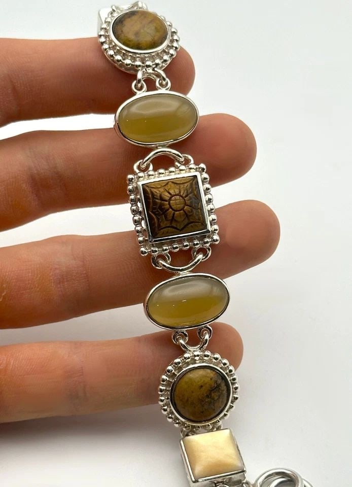 WHITNEY KELLY 925 STERLING SILVER CARVED STONES BRACELET (8 INCH) 50.9 GRAM: WHITNEY KELLY WK 925 STERLING SILVER CARVED MULTI STONES BRACELET 8 INCHES Whitney Kelly WK 925 Sterling Silver Carved Multi Stones Bracelet 8 inches Condition: Used Material: 925 Sterling Silver Weig