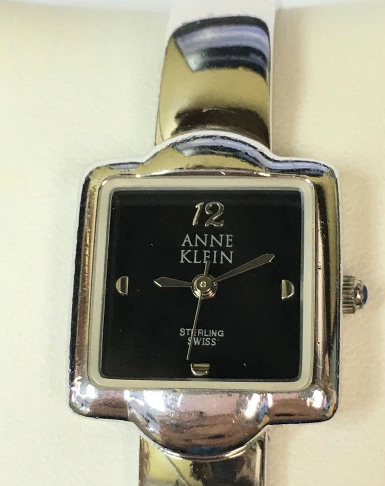 WOMAN'S ANNE KLEIN 925 STERLING SILVER QUARTZ WATCH 6.5 INCHES 52G: WOMAN'S ANNE KLEIN 925 STERLING SILVER QUARTZ WATCH Woman's Anne Klein 925 Sterling Silver Quartz Battery Watch You are bidding on a pre-owned Woman's Anne Klein 925 Sterling Silver Quartz Battery Wat