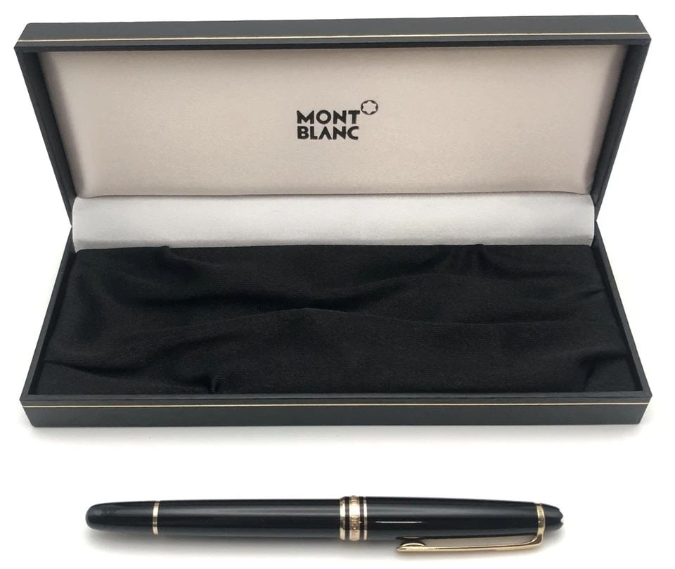 MONT BLANC BLACK PEN WITH GOLD COLORED TRIM AND ORIGINAL CASE: MONT BLANC BLACK PEN WITH GOLD COLORED TRIM AND ORIGINAL CASE Mont Blanc Black Pen with Gold Colored Trim and Original Case You are bidding on a Mont Blanc Black Pen with Gold Colored Trim and Origina