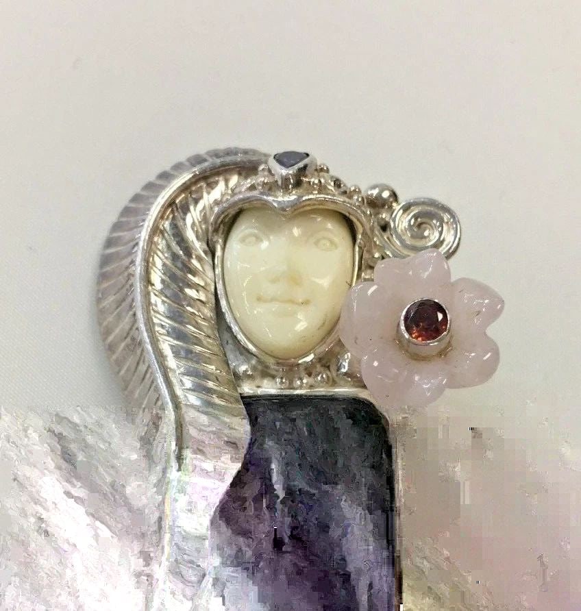 SAJEN STERLING SILVER PENDANT WITH FACE AND FLOWER 27 GRAM: SAJEN STERLING SILVER PENDANT WITH FACE AND FLOWER Sajen Sterling Silver Pendant with Face and Flower You are bidding on a pre-owned Sajen Sterling Silver Pendant with Face and Flower. There are few m