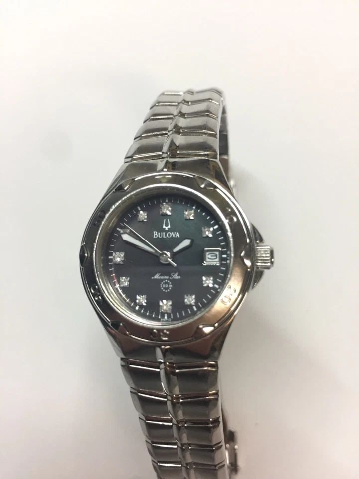 BULOVA 96P12 WOMEN'S WATCH BLACK MOTHER OF PEARL MARINE STAR DIAMONDS (1 of 2)