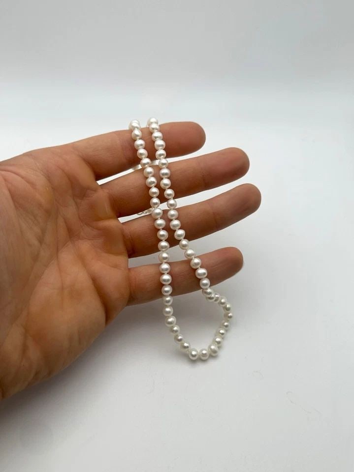 FRESHWATER PEARL NECKLACE 10K GOLD CLASP, 6MM WIDE ( 18 INCH ) 19.3 GRAM: FRESHWATER PEARL NECKLACE 10K GOLD CLASP, 6MM WIDE, 18 INCHES LONG, 19.3 GRAMS Freshwater Pearl Necklace 10k Gold Clasp, 6mm wide, 18 Inches Long, 19.3 grams Condition: Used Material: 10k Yellow Gold 