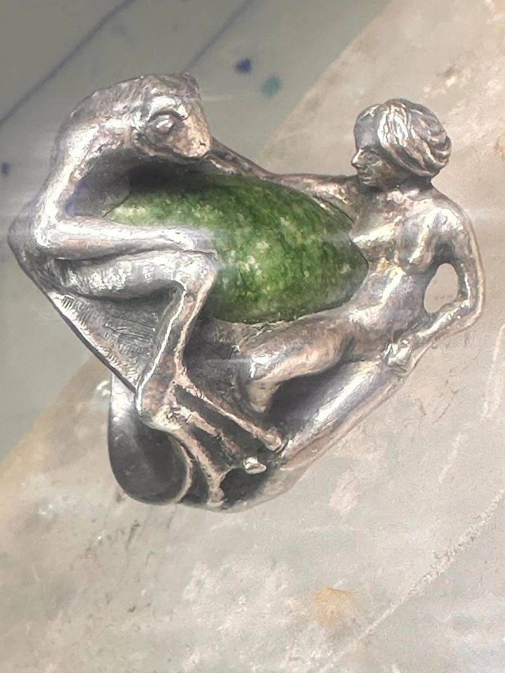 VINTAGE FROG AND NAKED LADY RING HEAVY WITH GREEN STONE SIZE 5 STERLING SILVER W: VINTAGE FROG AND NAKED LADY RING HEAVY WITH GREEN STONE SIZE 5 STERLING SILVER W Vintage frog and naked lady ring heavy with green stone size 5 Sterling silver women Size 5 Weight.30.4g Length. 1 3/8"