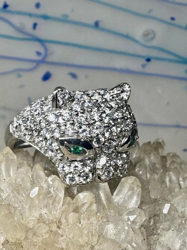 CAT RING SONIA BITTON SIZE 8.75 BIG CAT STERLING SILVER WOMEN: CAT RING SONIA BITTON SIZE 8.75 BIG CAT STERLING SILVER WOMEN Cat ring Sonia Bitton size 8.75 Big Cat sterling silver women Size 8.75 Weight. 7.8g Length. 3/4" Width5/8" Thinnest pat of band 1/8"