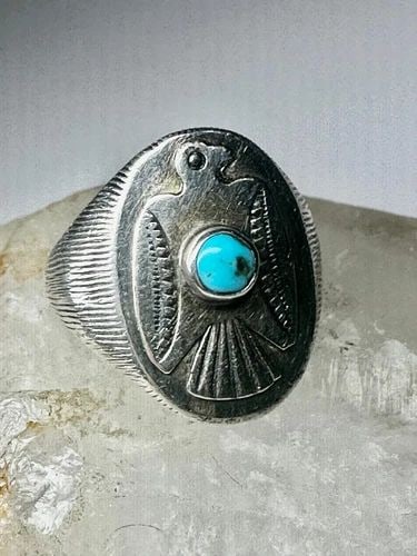 PHOENIX RING NAVAJO BAND SIZE 9.50 STERLING SILVER WOMEN MEN: PHOENIX RING NAVAJO BAND SIZE 9.50 STERLING SILVER WOMEN MEN Phoenix ring Navajo band size 9.50 sterling silver women men Size 9.50 Weight 10.9g Length. 7/8" Widest part 3/8" Thinnest part of band 3/1