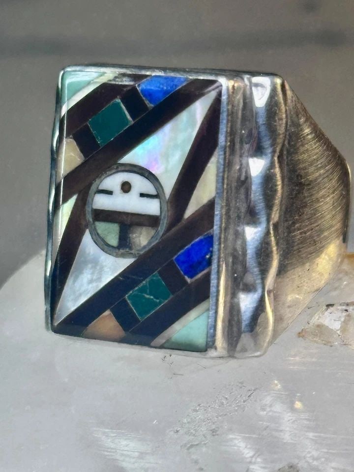 ZUNI RING SUN FACE LAPIS MOTHER OF PEARL TURQUOISE SIZE 10.50 STERLING SILVER WO: ZUNI RING SUN FACE LAPIS MOTHER OF PEARL TURQUOISE SIZE 10.50 STERLING SILVER WO Zuni Ring sun face lapis mother of pearl turquoise size 10.50 sterling silver women men Size 10.50 Between a size 10.50