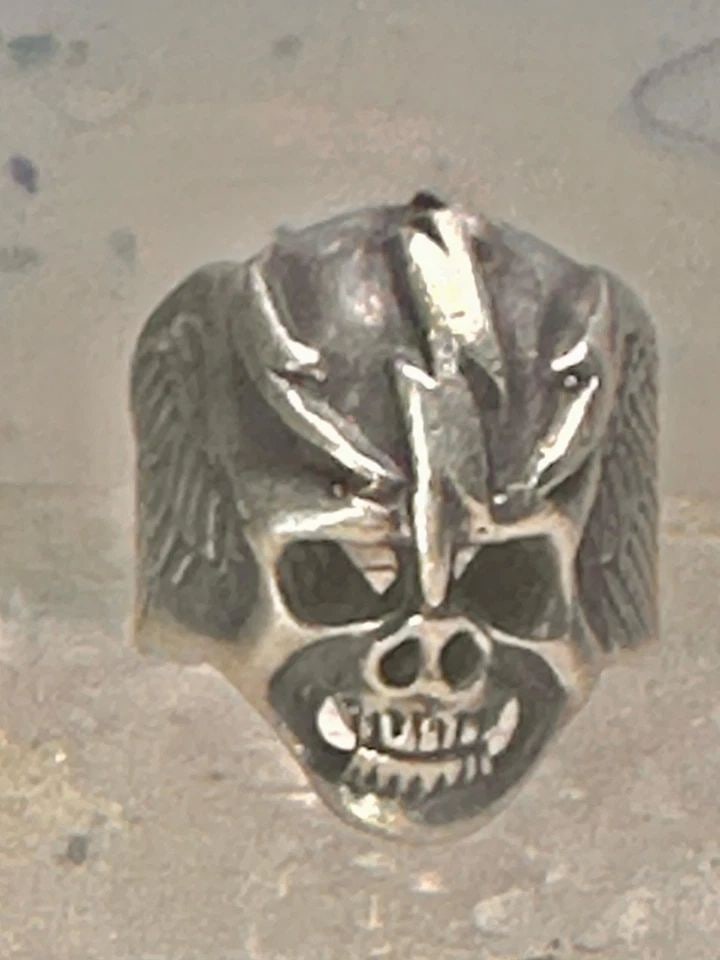 SKULL RING LIGHTENING BOLT BIKER BAND SIZE 9.75 STERLING SILVER WOMEN MEN: SKULL RING LIGHTENING BOLT BIKER BAND SIZE 9.75 STERLING SILVER WOMEN MEN Skull ring lightening bolt biker band size 9.75 sterling silver women men Size 9.75 Between a size 9.75 and a size 10 Weight. 