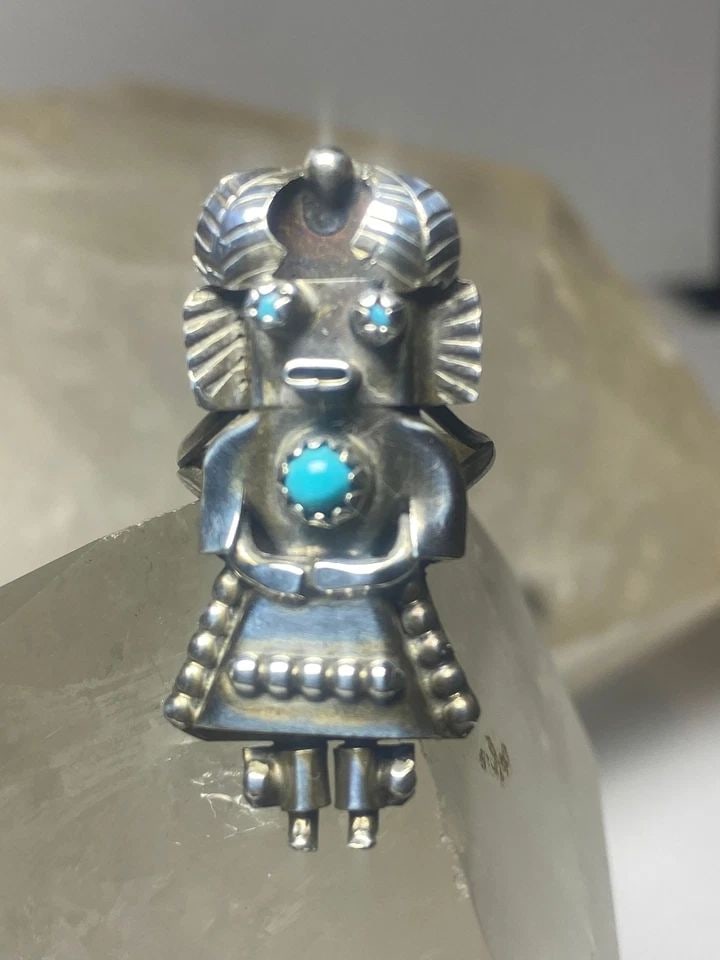 KACHINA RING TURQUOISE NAVAJO STERLING SILVER WOMEN: KACHINA RING TURQUOISE NAVAJO STERLING SILVER WOMEN Kachina ring turquoise Navajo sterling silver women Size 6 Weight 6.2g Length 1 1/2" Width 5/8" Thinnest part 1/8"