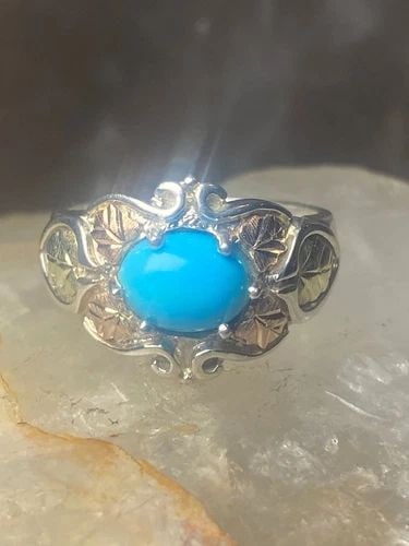 BLACK HILLS GOLD RING SIZE 6 TURQUOISE LEAVES STERLING SILVER WOMEN GIRLS: BLACK HILLS GOLD RING SIZE 6 TURQUOISE LEAVES STERLING SILVER WOMEN GIRLS Black Hills Gold ring turquoise leaves sterling silver women girls Size 6 Weight 3.9g Width 1/2" Thinnest part of band in back