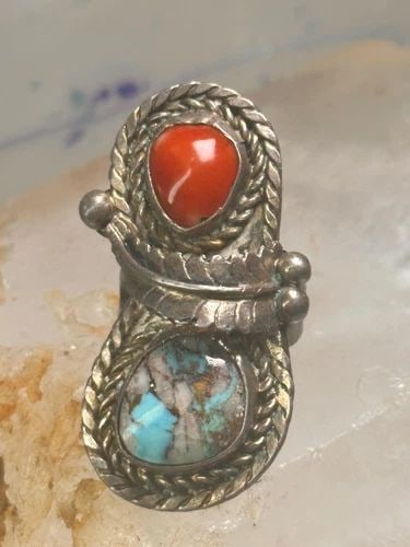 NAVAJO RING FEATHER TURQUOISE CORAL SIZE 6.75 STERLING SILVER WOMEN: NAVAJO RING FEATHER TURQUOISE CORAL SIZE 6.75 STERLING SILVER WOMEN Navajo ring feather turquoise coral size 6.75 sterling silver women Size 6.75 Weight 11.5g Length 1 5/8" Width 7/8" Thinnest part of
