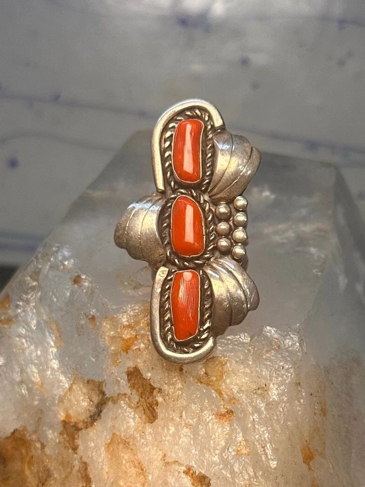 NAVAJO LONG RING CORAL SIZE 5.5 STERLING SILVER WOMEN: NAVAJO LONG RING CORAL SIZE 5.5 STERLING SILVER WOMEN Navajo long ring coral size 5.5 sterling silver women Size 5.5 Weight 14.8g Length 2" Width 1" Thinnest part of band 3/16"