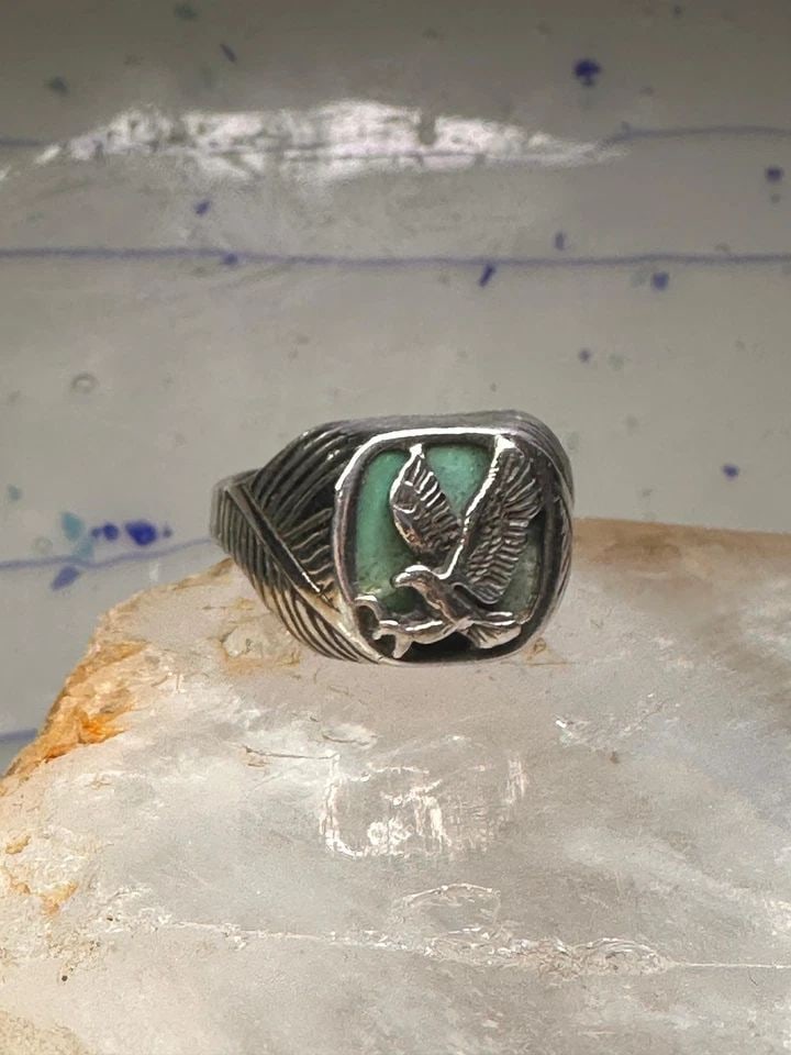 EAGLE RING SOUTHWEST TURQUOISE BAND SIZE 13.2 STERLING SILVER MEN WOMEN: EAGLE RING SOUTHWEST TURQUOISE BAND SIZE 13.2 STERLING SILVER MEN WOMEN Eagle Ring Wm Wheeler Turquoise band size 13.2 sterling silver men women Size 13.2 Weight 11.5g Length. 3/4" Width 1/2" Thinnest