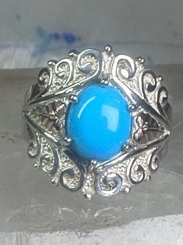 BLACK HILLS GOLD RING TURQUOISE BAND SIZE 8 STERLING SILVER WOMEN GIRLS: BLACK HILLS GOLD RING TURQUOISE BAND SIZE 8 STERLING SILVER WOMEN GIRLS Black Hills Gold ring Turquoise band size 8 sterling silver women girls Size 8 Weight 7.8g Width. 3/4" Thinnest part of band 5/3