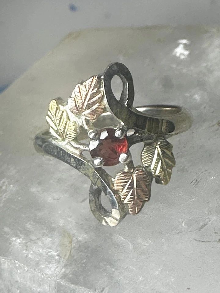 BLACK HILLS GOLD RING SIZE 5.75 GARNET LEAVES STERLING SILVER WOMEN GIRLS: BLACK HILLS GOLD RING SIZE 5.75 GARNET LEAVES STERLING SILVER WOMEN GIRLS Black Hills Gold ring size 5.75 garnet leaves sterling silver women girls 12K over sterling silver on the leaves Size 5.75 Wei