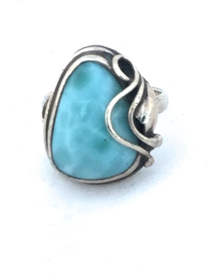 LARIMAR RING SIZE 7.5 STERLING SILVER ART DECO INFLUENCES: LARIMAR RING SIZE 7.5 STERLING SILVER ART DECO INFLUENCES Larimar Ring Size 7.50 sterling silver Art Deco influences A slight indentation on the outside of the band on the back of the band Size 7.50<