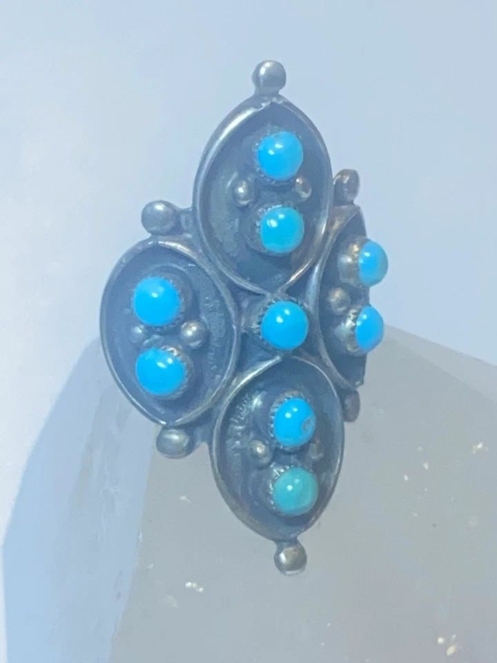 TURQUOISE RING ZUNI BAND PETITE POINT SOUTHWEST STERLING SILVER WOMEN GIRLS: TURQUOISE RING ZUNI BAND PETITE POINT SOUTHWEST STERLING SILVER WOMEN GIRLS Turquoise ring Petite Point band southwest sterling silver women girls Size 7.25 Weight. 4.1g Length 1. 3/8" Width. 9/32" Th