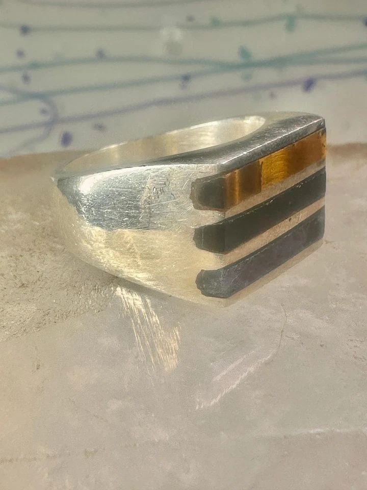 MEXICO RING TIGER EYE SIZE 9.75 INLAID STERLING SILVER MEN WOMEN: MEXICO RING TIGER EYE SIZE 9.75 INLAID STERLING SILVER MEN WOMEN Mexico ring tiger eye size 9.75 inlaid sterling silver men women Size 9.75 Weight 15.9g Length 1/2" Width 5/8" Thinnest part of band 7/
