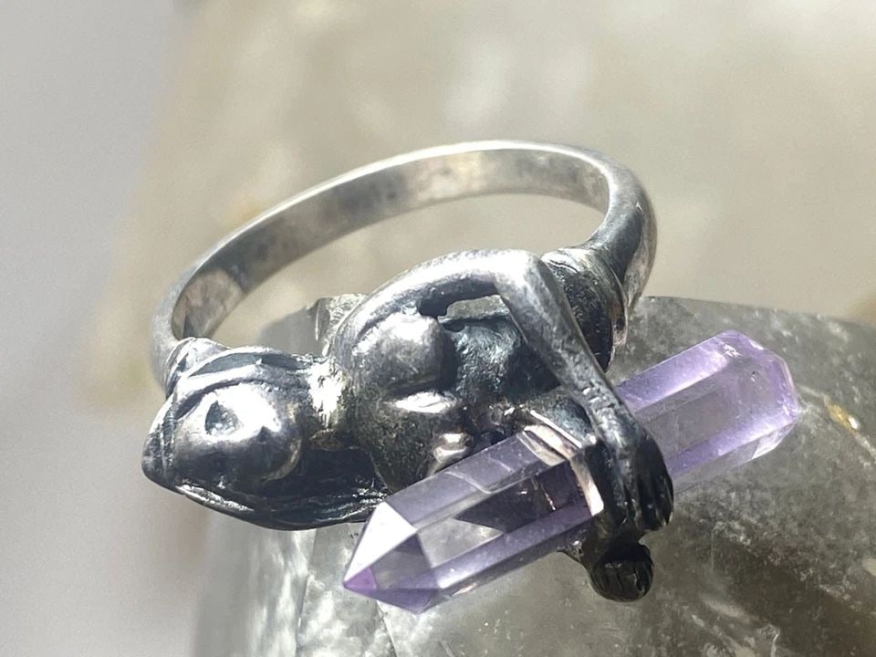 NUDE LADY RING SIZE 7 WITH CRYSTAL BAND STERLING SILVER WOMEN: NUDE LADY RING SIZE 7 WITH CRYSTAL BAND STERLING SILVER WOMEN Nude lady ring size 7 with crystal band sterling silver women Size 7 Weight 5.5g Length. 1/2" Width. 3/4" Thinnest part 1/8"