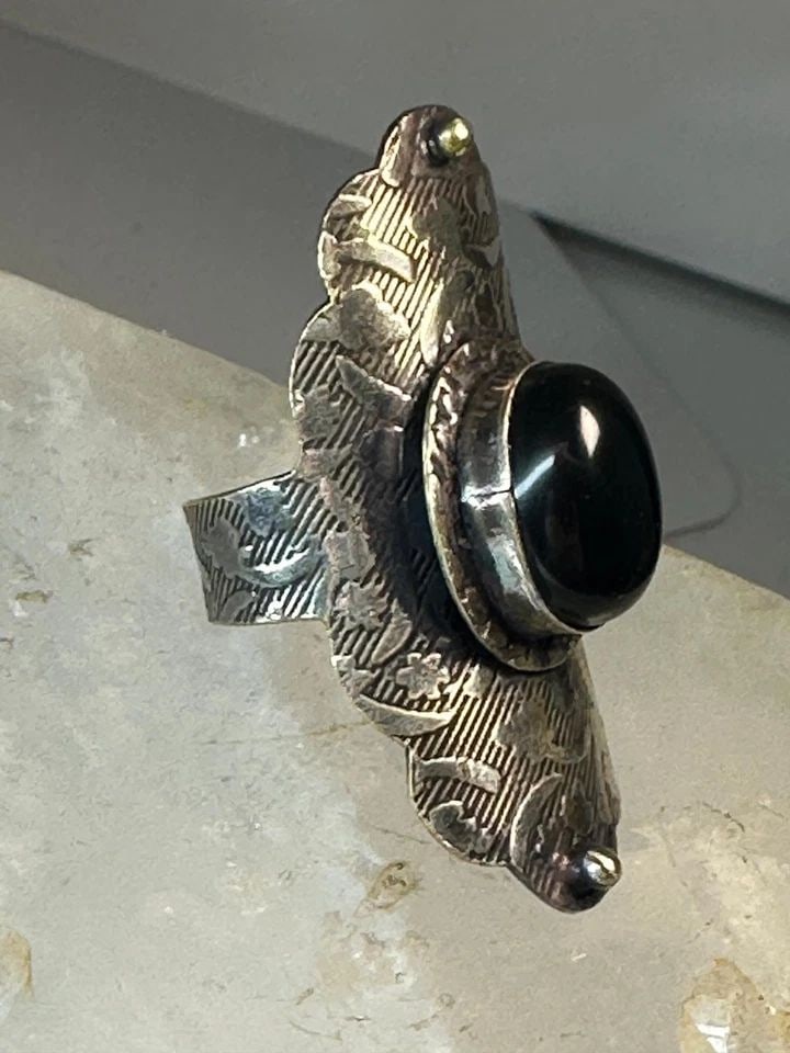 ONYX RING LONG STAMPED BOHO BAND SIZE 8.75 STERLING SILVER WOMEN: ONYX RING LONG STAMPED BOHO BAND SIZE 8.75 STERLING SILVER WOMEN Onyx ring long stamped boho band size 8.75 sterling silver women Size 8.75 Weight 9g Length 1 3/4" Width 5/8" Thinnest part of band in 