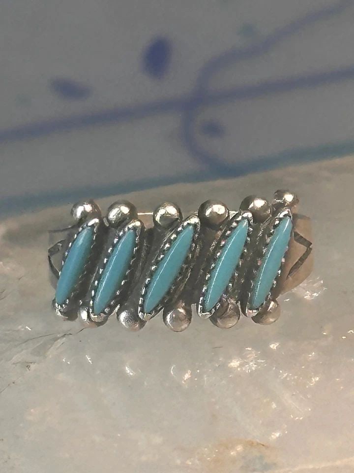 ZUNI TURQUOISE RING PETIT POINT NEEDLEPOINT SIZE 5.25 BAND STERLING SILVER WOMEN: ZUNI TURQUOISE RING PETIT POINT NEEDLEPOINT SIZE 5.25 BAND STERLING SILVER WOMEN Zuni Turquoise ring petite point needlepoint size 5.25 band sterling silver women girls Size 5.25 Weight 3g Width. 3/8"