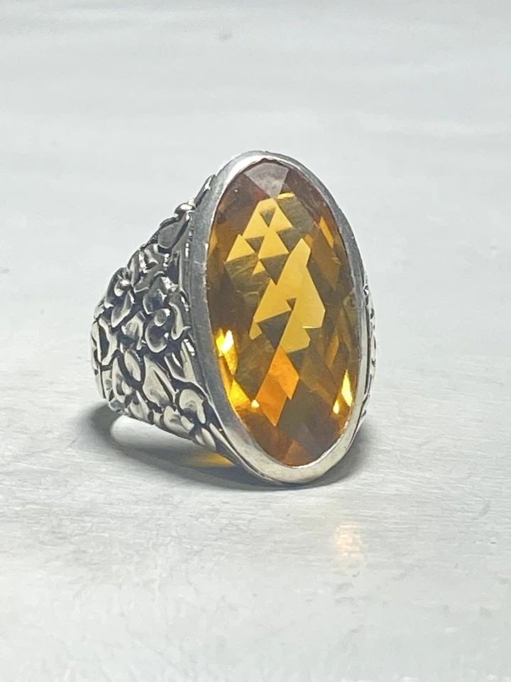 CITRINE RING SIZE 7.50 FLORAL BAND STERLING SILVER WOMEN: CITRINE RING SIZE 7.50 FLORAL BAND STERLING SILVER WOMEN Citrine ring floral band sterling silver women Size 7.50 Between a size 7.50 and a size 7.75 Weight 14.3g Length 1 1/32" Width. 1/2" Thinnest p