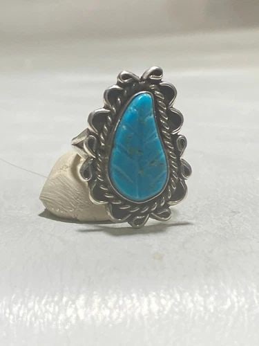 TURQUOISE RING SOUTHWEST STERLING SILVER BAND WOMEN GIRLS: TURQUOISE RING SOUTHWEST STERLING SILVER BAND WOMEN GIRLS Turquoise ring leaf southwest sterling silver band women girls Size 5.75 Weight 5.6g Length of band 1" Width of band. 3/4" Thinnest part of ba