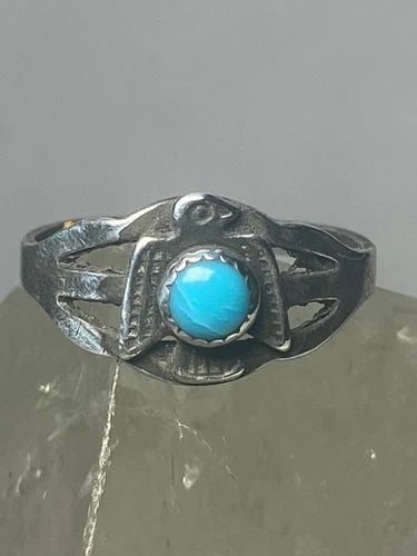 PHOENIX RING NAVAJO BAND TURQUOISE SOUTHWEST STERLING SILVER WOMEN GIRLS: PHOENIX RING NAVAJO BAND TURQUOISE SOUTHWEST STERLING SILVER WOMEN GIRLS Phoenix ring Navajo band turquoise southwest sterling silver women girls Size 4.50 Weight 1.6g Widest part 3/8" Thinnest part 1