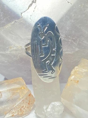 KOKOPELLI RING LONG STERLING SILVER SOUTHWEST WOMEN: KOKOPELLI RING LONG STERLING SILVER SOUTHWEST WOMEN Kokopelli ring long sterling silver southwest women Size. 5.75 Between and size 5.75 and a size 6 Weight 5g Length. 1 5/16" Width. 5/8" Narr