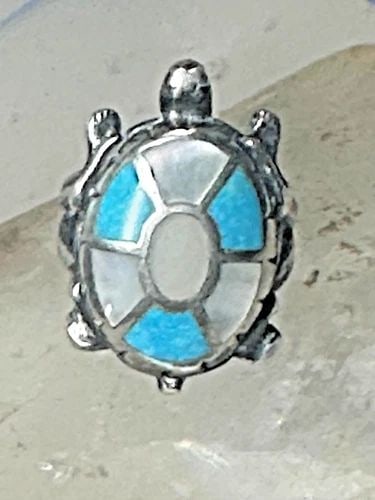 ZUNI TURTLE RING SIZE 5 TURQUOISE MOTHER OF PEARL STERLING SILVER WOMEN GIRLS: ZUNI TURTLE RING SIZE 5 TURQUOISE MOTHER OF PEARL STERLING SILVER WOMEN GIRLS Zuni Turtle ring size 5 turquoise Mother of pearl sterling silver women girls Size 5 Weight 8g Length 1" Width 5/8" Thinne