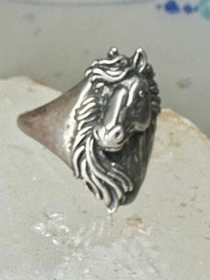 HORSE RING SOUTHWEST COWGIRL BAND SIZE 5.75 STERLING SILVER WOMEN GIRLS: HORSE RING SOUTHWEST COWGIRL BAND SIZE 5.75 STERLING SILVER WOMEN GIRLS Horse ring southwest cowgirl band size 5.75 sterling silver women girls Size 5.75 Weight 7.5g Width 7/8" Band in Back 1/8"