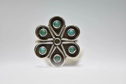 ZUNI RING FLOWER TURQUOISE PETITE POINT STERLING SILVER WOMEN: ZUNI RING FLOWER TURQUOISE PETITE POINT STERLING SILVER WOMEN Zuni ring flower turquoise petite point sterling silver women size 6.25 Between a size 6.25 and a size 6.50 weight 5.9g Widest part of ban