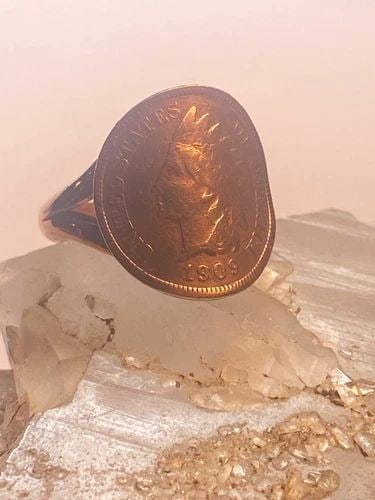 COIN RING SIZE 7.75 1909 USA COPPER WOMEN GIRLS: COIN RING SIZE 7.75 1909 USA COPPER WOMEN GIRLS Coin ring 1909 USA copper women girls Size 7.75 Between a size 7.75 and a size 8 Weight. 6.1g Length 3/4" Width 11/16" Thinnest part of band 5/32"