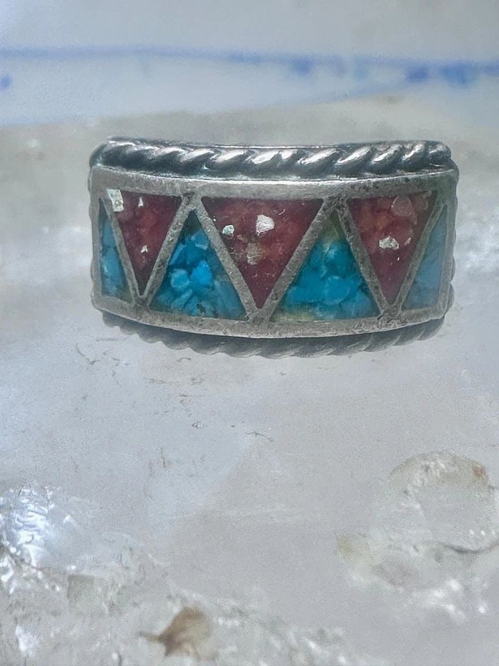 ZUNI RING WEDDING BAND STERLING SILVER TURQUOISE CORAL CHIPS SIZE 9 MEN WOMEN: ZUNI RING WEDDING BAND STERLING SILVER TURQUOISE CORAL CHIPS SIZE 9 MEN WOMEN Zuni ring wedding band sterling silver Turquoise Coral chips size 9 men women Size 9 Weight 9.6g Width 1/2" Thinnest part 