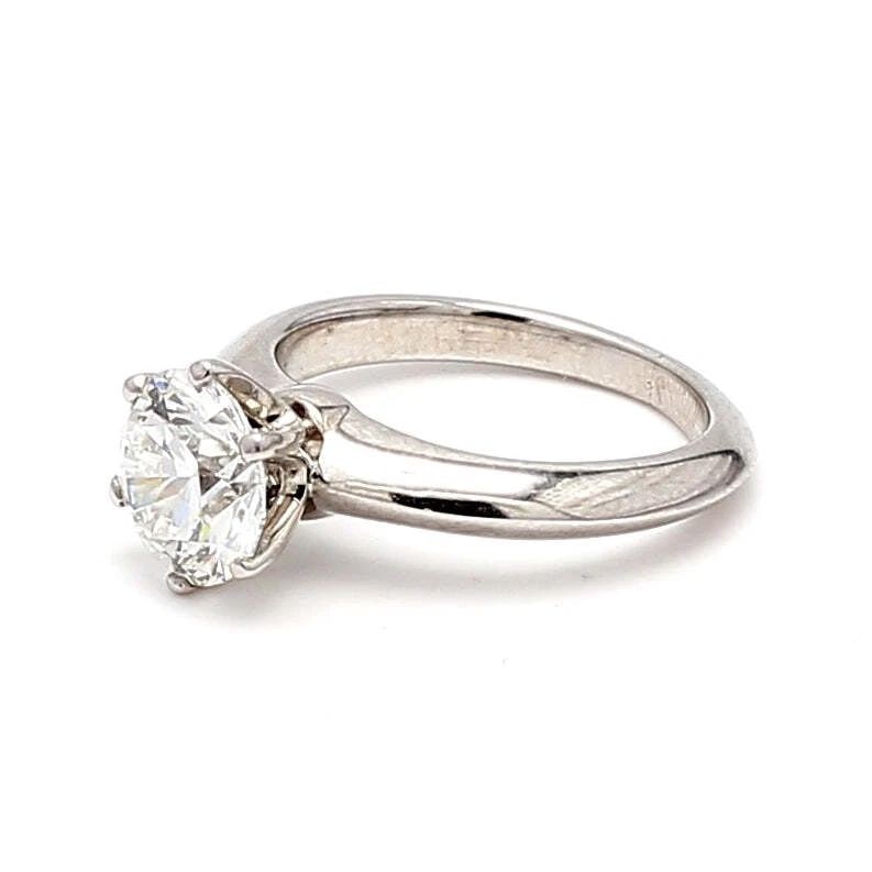 TIFFANY & CO.. 1.51 CARAT F-VS1 DIAMOND PLATINUM ENGAGEMENT RING: TIFFANY & CO.. 1.51 CARAT F-VS1 DIAMOND PLATINUM ENGAGEMENT RING Title: Tiffany and Co 1.51 Carat Round Brilliant Shape F-VS1 Diamond Platinum Engagement Ring Style: Engagement Metal: Platinum Gemston