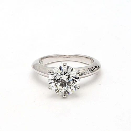 TIFFANY & CO.. 1.88 CARAT ROUND BRILLIANT H-VS2 DIAMOND PLATINUM RING: TIFFANY & CO.. 1.88 CARAT ROUND BRILLIANT H-VS2 DIAMOND PLATINUM RING Title: Tiffany and Co 1.88 Carat Round Brilliant H-VS2 Diamond Platinum Engagement Ring Style: Engagement Metal: Platinum Gemstone