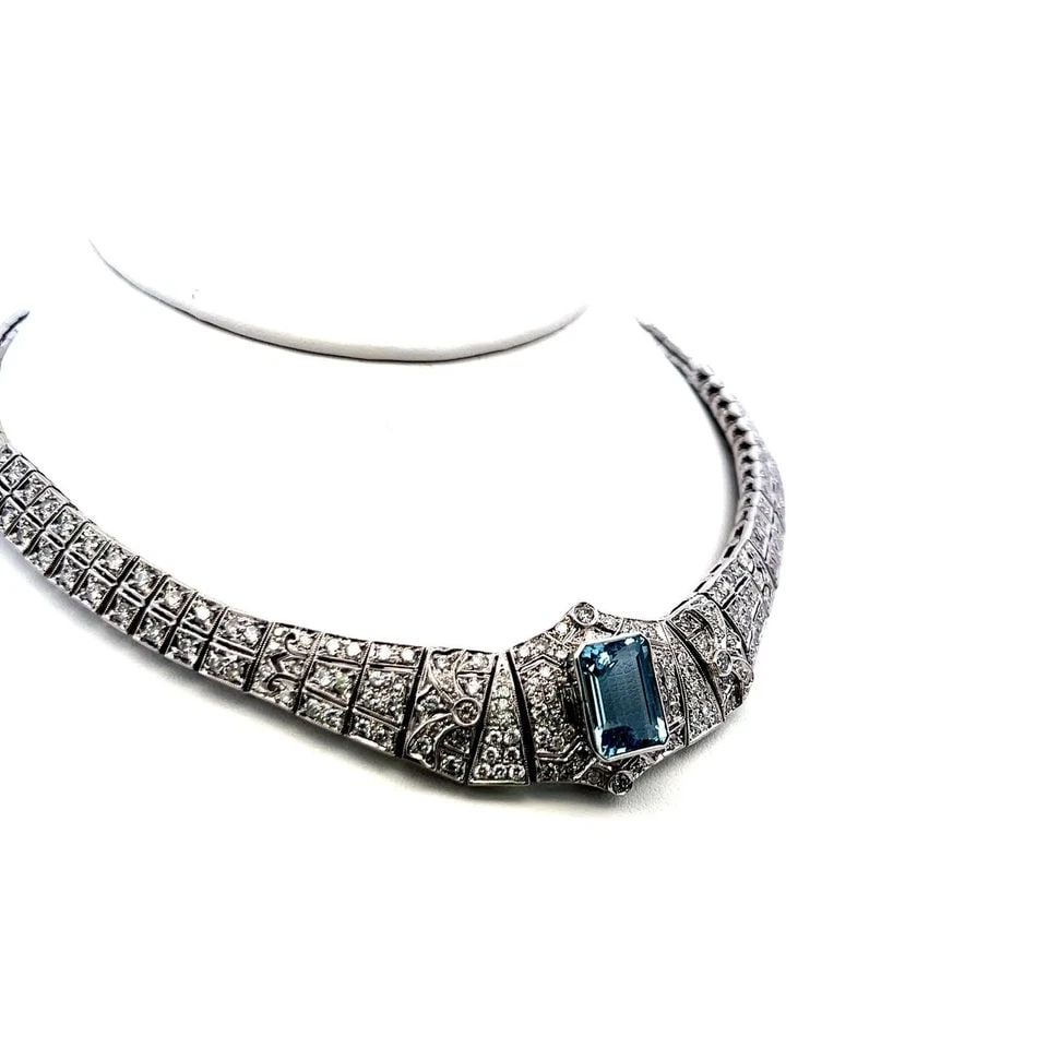 18K WG COLLAR NECKLACE WITH 6CT ROUND I SI DIAMONDS & 13X9.75X6.20 MM AQUAMARINE: 18K WG COLLAR NECKLACE WITH 6CT ROUND I SI DIAMONDS & 13X9.75X6.20 MM AQUAMARINE 18K WG COLLAR NECKLACE WITH 6CT ROUND I SI DIAMONDS & 13X9.75X6.20 MM AQUAMARINE PRODUCT DESCRIPTION Detailed Descripti