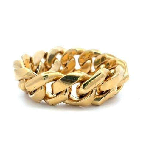 VINTAGE CUBAN 99.70 GRAMS 18 KARAT YELLOW GOLD LINK BRACELET: VINTAGE CUBAN 99.70 GRAMS 18 KARAT YELLOW GOLD LINK BRACELET Title: 18 Karat Yellow Gold Link Bracelet Style: Link Metal: 18 Karat Yellow Gold Dimension: 8*0.85*0.29IN Weight: 99.7 Grams Condition: Vi
