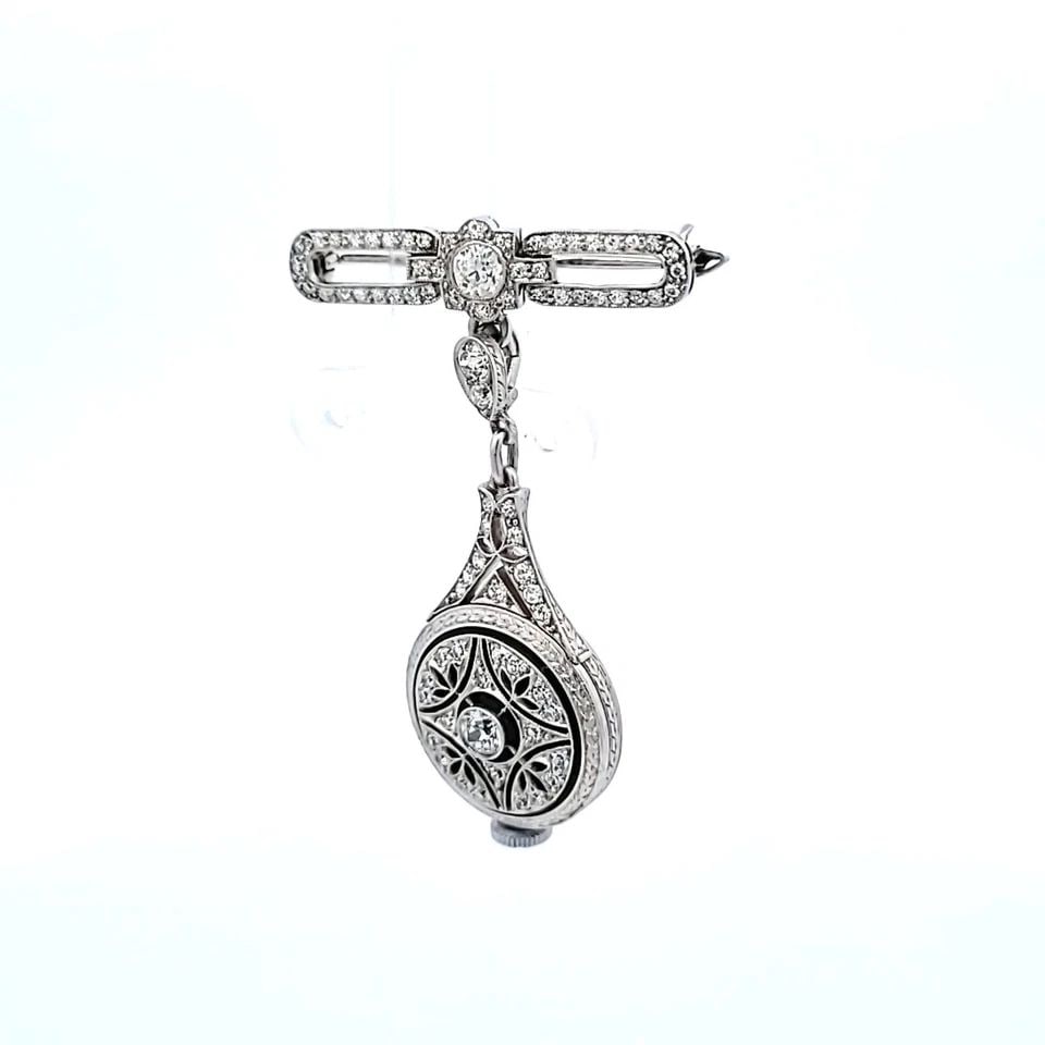 TIFFANY & CO PLATINUM PENDANT WATCH WITH 2 CARAT ROUND H VS1 DIAMONDS: TIFFANY & CO PLATINUM PENDANT WATCH WITH 2 CARAT ROUND H VS1 DIAMONDS TIFFANY & CO PLATINUM PENDANT WATCH WITH 2 CARAT ROUND H VS1 DIAMONDS PRODUCT DESCRIPTION Designer: Tiffany & Co Detailed Descript