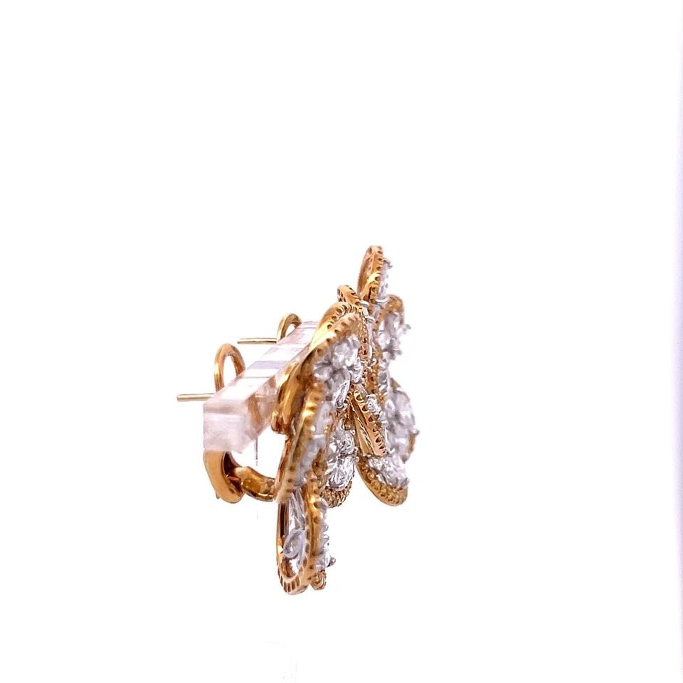10.10CT DIAMOND & FANCY YELLOW TWO-TONE GOLD FLORAL CLIP-ON EARRINGS VINTAGE: 10.10CT DIAMOND & FANCY YELLOW TWO-TONE GOLD FLORAL CLIP-ON EARRINGS VINTAGE Title: These exquisite 10.10-carat floral clip-on earrings showcase an elegant two-tone design crafted in 18K yellow gold a