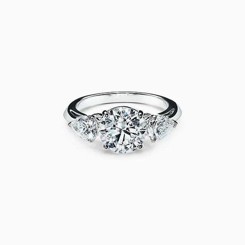 TIFFANY & CO.. 1.25 CARAT G-VVS2 DIAMOND PLATINUM THREE-STONE RING (1 of 2)