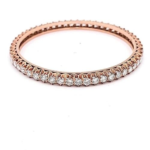 ANTIQUE 14K ROSE GOLD BANGLE BRACELET WITH 8.55 CARAT ROUND DIAMONDS SIZE 7: ANTIQUE 14K ROSE GOLD BANGLE BRACELET WITH 8.55 CARAT ROUND DIAMONDS SIZE 7 Detailed Description: Elevate your style with this stunning 14 Karat Rose Gold Bangle, adorned with 8.55 carats of sparkling