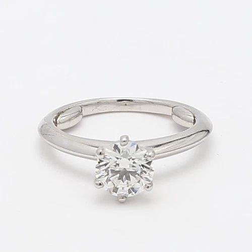 TIFFANY & CO.. 1.07 CARAT H-VS1 DIAMOND PLATINUM ENGAGEMENT RING: TIFFANY & CO.. 1.07 CARAT H-VS1 DIAMOND PLATINUM ENGAGEMENT RING Title: Tiffany and Co 1.07 Carat Round Brilliant Shape H-VS1 Diamond Platinum Engagement Ring Style: Engagement Metal: Platinum Gemston