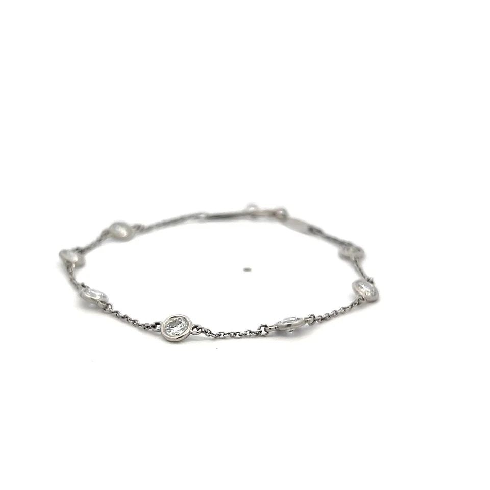 TIFFANY & CO PLATINUM LINK BRACELET WITH 1.26 CARAT ROUND F-VS DIAMONDS: TIFFANY & CO PLATINUM LINK BRACELET WITH 1.26 CARAT ROUND F-VS DIAMONDS TIFFANY & CO PLATINUM LINK BRACELET WITH 1.26 CARAT ROUND F-VS DIAMONDS PRODUCT DESCRIPTION Designer: Tiffany & Co Detailed Desc